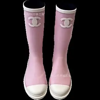Pink Chanel rain boots